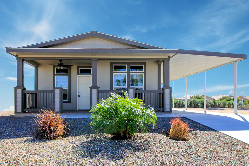 Our manufactured homes come often with covered porches and a carport. And with low maintenance yard work