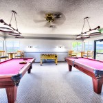 For activities, a game room with pool tables, foosball, and bar stools and tables to sit at. Beautiful views of the city and mountains through the windows.