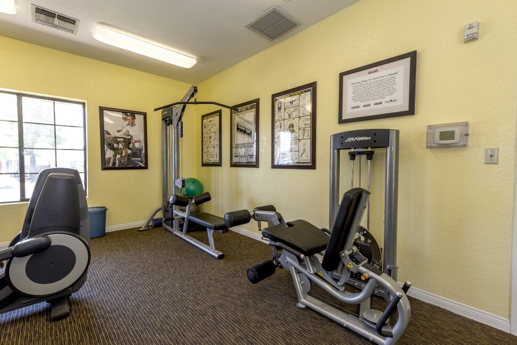 Fitness center with weight machines.