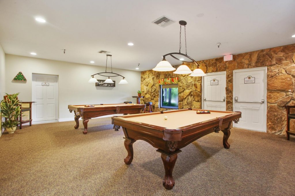 Game room with 2 pool tables.