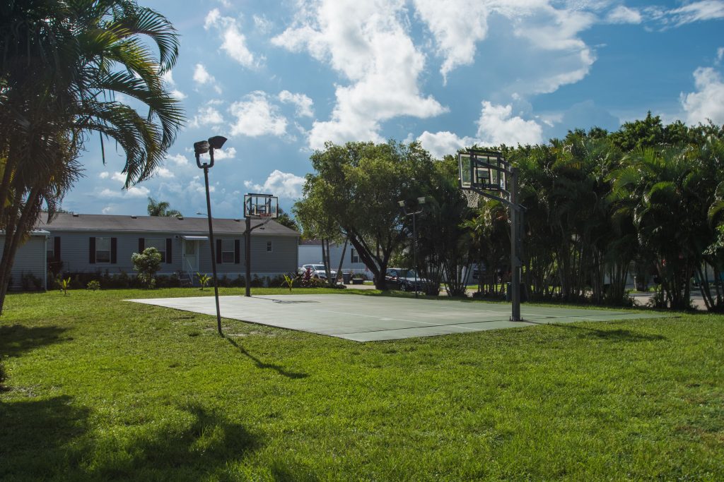 Children can also enjoy the outdoor basketball court with hoops on either end. There are lights for evening game.