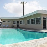 Welcoming community clubhouse and outdoor pool available for residents to reserve for parties and family events.