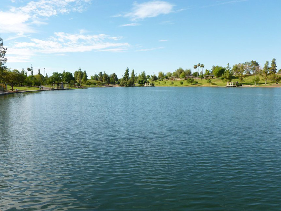 Beautiful, clean, peaceful lake with surrounding lush hillsides