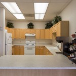 Community kitchen at the clubhouse with oven, fridge and plenty of counterspace for parties or events.